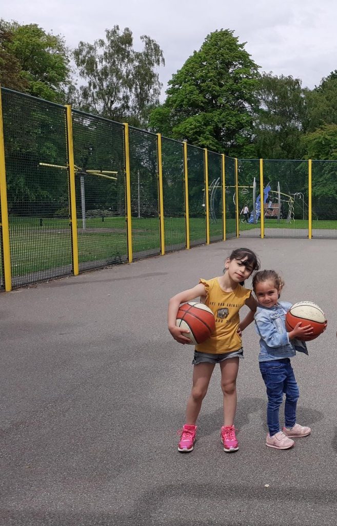 Syrian families playing basketball