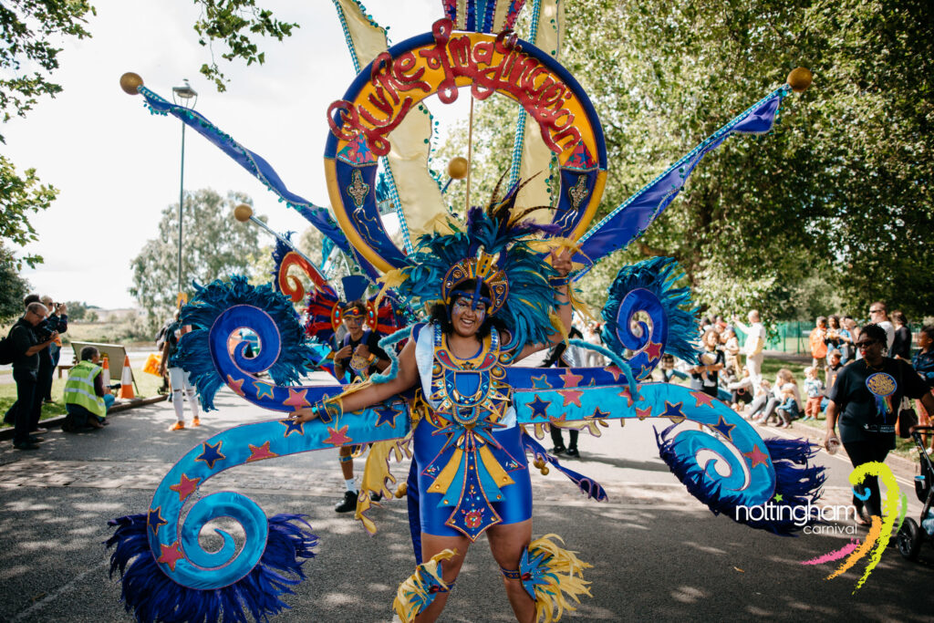 Woman in a costume taking part in the Nottingham Carnival Parade