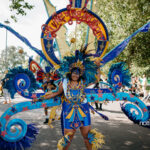 Woman in a costume taking part in the Nottingham Carnival Parade